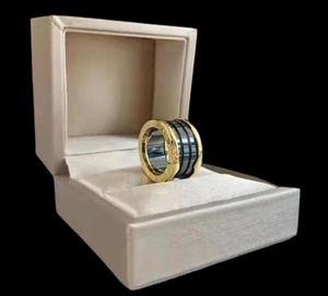 Roségold Spring Pressable Ring Schwarz -Weiß -Bandringe Keramik Doppelpaar Ring Hochqualität Elektroplatte Neuankömmling EN7073036