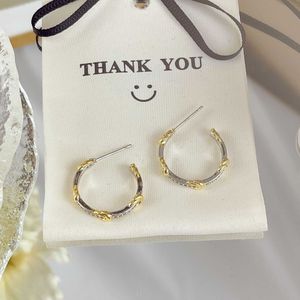 French New Forest Light Luxury Style Two tone Knot C-shaped Earrings Fashionable and Elegant Elegance Earrings