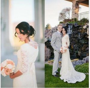 Romantyczne suknie ślubne plażowe 2017 z 34 rękawem klejnot koronkowy Skromny biały boho bohemijska suknia ślubna Vestidos de Noiva Country ST6789792