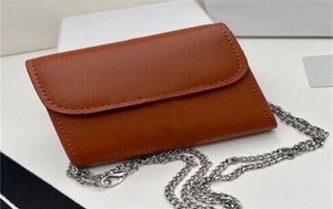 Liten plånbok i blankt läderduk Metallisk snap -knapp stängning plånböcker designer kvinnor med vikta myntficka avtagbar 5449813