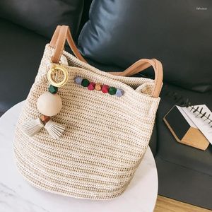 Drawstring Women's Wood Pärlor Decoration Leisure Straw Bag Axel Woven Bucket Wild Tassels Hair Ball Beach Handväska