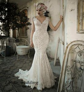 Tromba di alta qualità Mermaid senza maniche Vneck in pizzo senza schienale allena da lunghi abiti da sposa abiti da sposa8680559