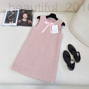 Grundläggande casual klänningar designer 24 tidigt vår ny nanyou rosa serie klassisk enkel och mångsidig reducerad ålder stickad ärmlös bågklänning f0ho