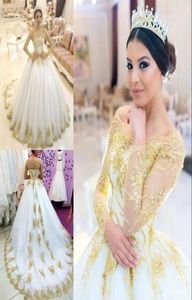 Luksusowa złota aplikacja ślubna seksowna z koraliki na ramię z koralikami długie rękawy tiulowe sukienki ślubne Wspaniale saudyjskie arabskie Weddin1220128
