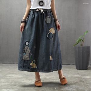 Kjolar tecknad broderi denim kvinnor vintage konst rippad överdimensionerad kvinnlig elastisk hög midja lång maxi jeans kjol