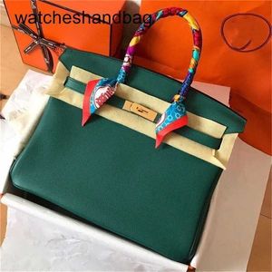 Frauen Designer -Tasche echtes Leder 7A Handswen Echtes Leder gestreiftes Vlqkqqqepgf