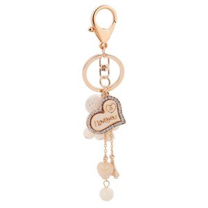 Anelli chiave di cuore di cuore Gioielli Tornari Rhinestone Chain Fashion Design Borsa a ciondolo a ciondolo Ciondolo per auto a portata di calcolo del porta da porta di marcia in metallo.