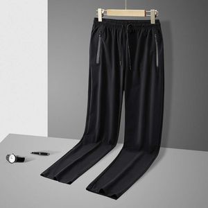 Ice silk pants men's summer thin casual pants Breathable bunched feet loose men's cool pants quick drying air conditioning sports pants