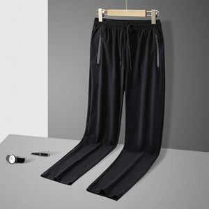 Ice Silk Pants Men Summer Thin Casual Pants Bortable Gunched Feet Loose Men's Cool Pants Snabbtorkning av luftkonditionering Sportbyxor