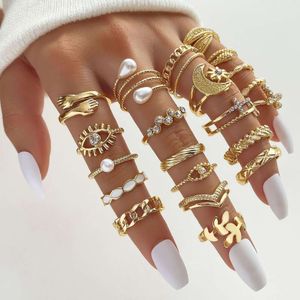 Hot Selling Diamond Studded Eyes, Cross Leaves, Multi Jointed 23 Piece Set of Pearl Sun Moon Rings