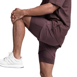 Palestra muscolosa da uomo sport pantaloncini casual a due piani 2in1 pantaloni corti pantaloni fitness sudore rapido short traspirabilità secco 240409