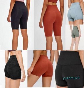 Kvinnliga leggings byxor designer kvinnor träning gym bär fast färg sport elastisk fitness dam övergripande anpassning korta kort