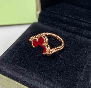 Revolve Style Red Agateと18K Rose Goldメッキの1つのダイヤモンドを備えた高級品質チャームパンクバンドリング