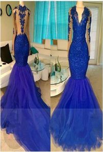 2K17 Real Shiny Royal Blue Mermaid Prom Dresses Sexig Illusion V Neck Långärmar Sträng rygglös Applique med pärlor Långt parti Evenin7151104