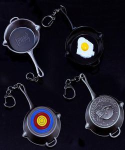 Meidi Game PUBG 4 Styles Freying Pan Keychain med olivgren Bullseye -mönster Figur Nyckelhållarens tillbehör för Fan SP13495921280