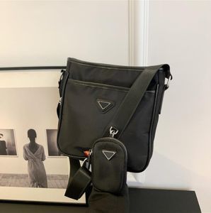 Gratis frakt högkvalitativ crossbody väska mini väska messenger väskor nylon axel väska handväska modedesigner plånbok ryggsäck män/kvinnor designers väskor p023