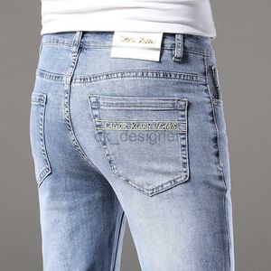 Jeans designer maschile jeans in chiaro jeans primavera/estate slim fit piccoli piedi alla moda pantaloni casual elastici di fascia alta