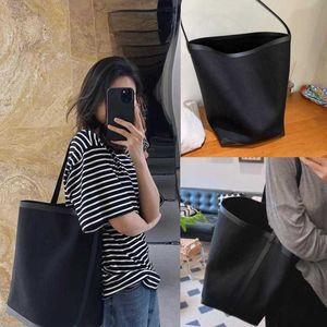 2024 Spring och Autumn New Park Tote Canvas Bag Bomull och hampa skarvad äkta läder One Shoulder Fashion Row Bucket Bag 240415