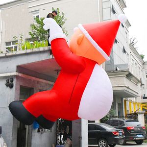 26ft high Custom Building Inflatable Climbing Santa With Gifts Mall Lighting Father Santas Claus For Christmas