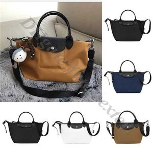 Single Straddle 2024 Dumpling Cross Body Påsar för kvinnor 2024 Bag Luxury Crossbody Shoulder Handheld Canvas Childrens Medium Skew Purses Tote Luxurys Handbag