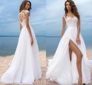 Bohemian eine Linie Hochzeitskleider Strand Chiffon Sheer Neck Spitzen Applikationen Illusion Cap Sleeves hohlen Rücken hoher Split -Brautkleider