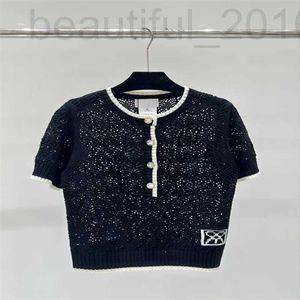 Kvinnors T-shirtdesigner 2024 Sommar Ny liten doftande stil söt och ålder reducerar rund hals ihålig kortärmad stickad t-shirt för kvinnors topp H9CQ