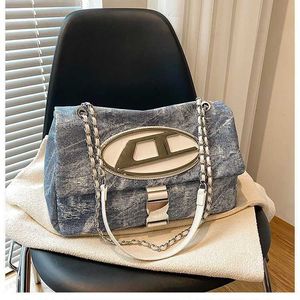 Clutch 2024 Designer tote bag Saddle Handbag Flap Jingle Women's Hobo Crossbody bag Underarm Mini tote bag 80NF