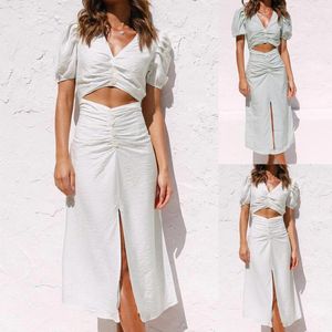 Casual Dresses Women Summer Sexig navelklänning V-Neck-knapp Oregelbunden kortärmad mode Elegant vit split för strand