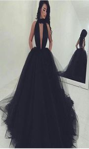 2017 Sexy Black Tulle Ball Gowns Evening Dresses Backless Halter Deep Plunning V Neck Prom Gowns with Pockets Formal Celebrity Dre3612015