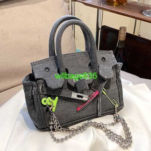 BK Totes Trusted Luxury Cloth Handväska som gör en gammal dukväska med en förfalskning av stift spänne 2024 New Women's Bag Bag handhållen One Shoulder Messenge Have Logo HBHJ65