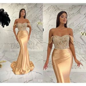 Underbara Champange Arabic Dubai Evening Dresses Off-the-Shoulder Mermaid Sequins Prom Dress med pärlor veckade långa kläder de de