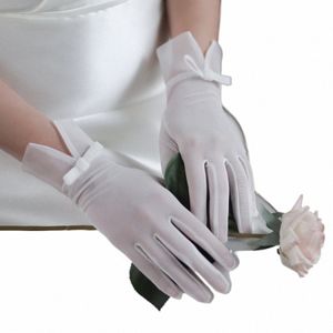 WG057絶妙な結婚式の白いブライダルグローブエラスティックメッシュボウブライドフィンガートップ手首手袋