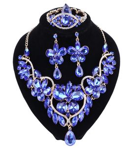 I nuovi orecchini di collana di fiore di strass blu cristallo set per donne set di gioielli da sposa di lusso di lussuoso