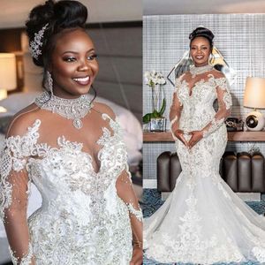 Afrikanska nigerianska kristallklänningar ren långärmare spetspärlade sjöjungfru brud bröllopsklänningar elegant mantel de mariee