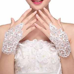 guanti da sposa avorio bianco all'ingrosso Appliques in pizzo in rilievo in pizzo a buon mercato Accorie di nozze sexy Noviia Bridal Gloves Q43P#