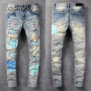 Designer Mens Jeans European American Ripped Men High Street Fashion Brand Cycling Motorcykelbroderier nära passande smala blyertsbyxor toppar