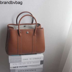 Garden Original Garden Party Tote Top -Taschen Großhandel teilweise Form Realer Lederbeutel können Inch -Computer und Dateien auf der ersten Schicht 36 mit echtem YJBJ enthalten