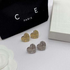 Projektant biżuterii celine Celins Celi Home Saijia nowa miłość pełne diamentowe kolczyki francuskie małe i popularne wysokiej klasy brzoskwiniowe serce srebrne augie na żywo