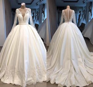 Modest Long Illusion Sleeves Ball Gown Wedding Dresses Plunging V Neck Covered Buttons Back Satin Lace Applique Sweep Train Wedding Gowns