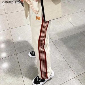 Men's Pants Mens Pants Needles Casual Trousers Apricot Red Stripe Zipper Pocket Men Woman High Quality 1 1 Butterfly Embroidery Sweatpants Q240417