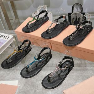 Sommar sandal designer skor mode läder damer sko romerska plattbotten sandaler strand loafers metall knapp sexiga diamanter kvinnor skor storlek 35-37-41 med låda