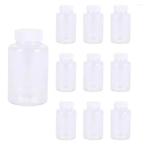 収納ボトル50PCS 15ML-100ML空の補充可能な透明なプラスチックジャーボトル旅行化粧品コンテナポットホルダーケースネジ蓋