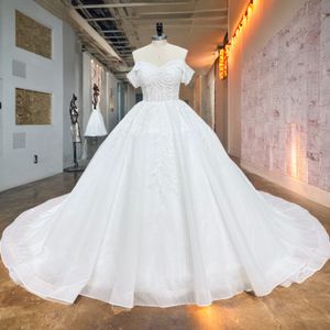 Hire Lnyer Sweetearh Neck Short Sleeve Lace Up Back Beading Lace Shiny Ball Gown Wedding Dresses Real Office Photos Video