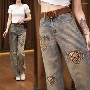 Kvinnors jeans löser hög midja broderi Rhinestone ihåliga fjärilsburrs denim byxor 2024 Autumn Fashion