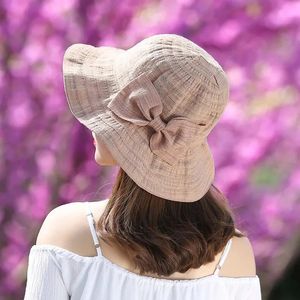 Kobiety Bow Bow Sun Hat z szerokim giełdą, usuwającą się letnią krem ​​przeciwsłoneczny anty UV Ochrona Fisherman Hat Lady oddychająca panama czapka 240415