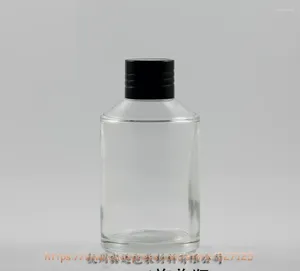 ストレージボトル200mlの透明な（天然）ガラス瓶、黒い蓋と還元剤。