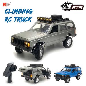 Diecast Model Cars MN78 1/12 RC CAR Cherokee 2.4G Off Road 4x4 Дистанционный управление автомобилем Jeep Led Light 4WD Electric Toy Car Подарок J240417