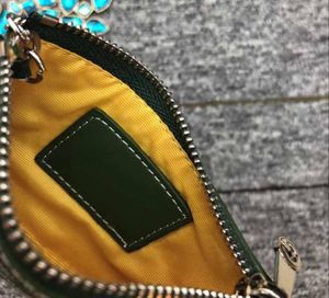 Najnowsza moda w stylu Paris Wysokiej jakości projektant torebki skórzana torebka na płótnie mężczyźni mężczyźni monety monety portfele mini portfele krótkie zip SMA2445317