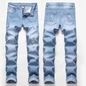 Мужская джинсовая джинсовая джинсовая дыра разрушена эластичная тенденция Слим повседневные брюки Высококачественные брюки моды большой размер