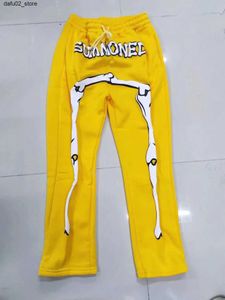 Calças masculinas 2024 Street Harajuku Esqueleto Y2K Pants American Mens e Mulheres Retro Retro de Duas cores Educação de Sweatwear Mulheres Q240417